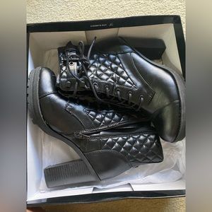 Guess heeled boots in black size 8.5 lightly worn